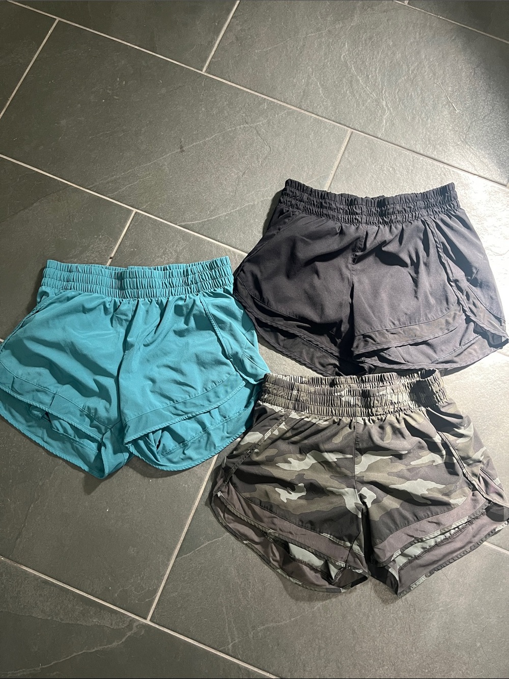 3 pair - Athleta Women’s Athletic Shorts - Black, Teal & Camo